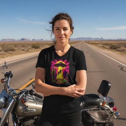 Neon Cow Abduction graphic V-neck tee worn in the Southwest desert