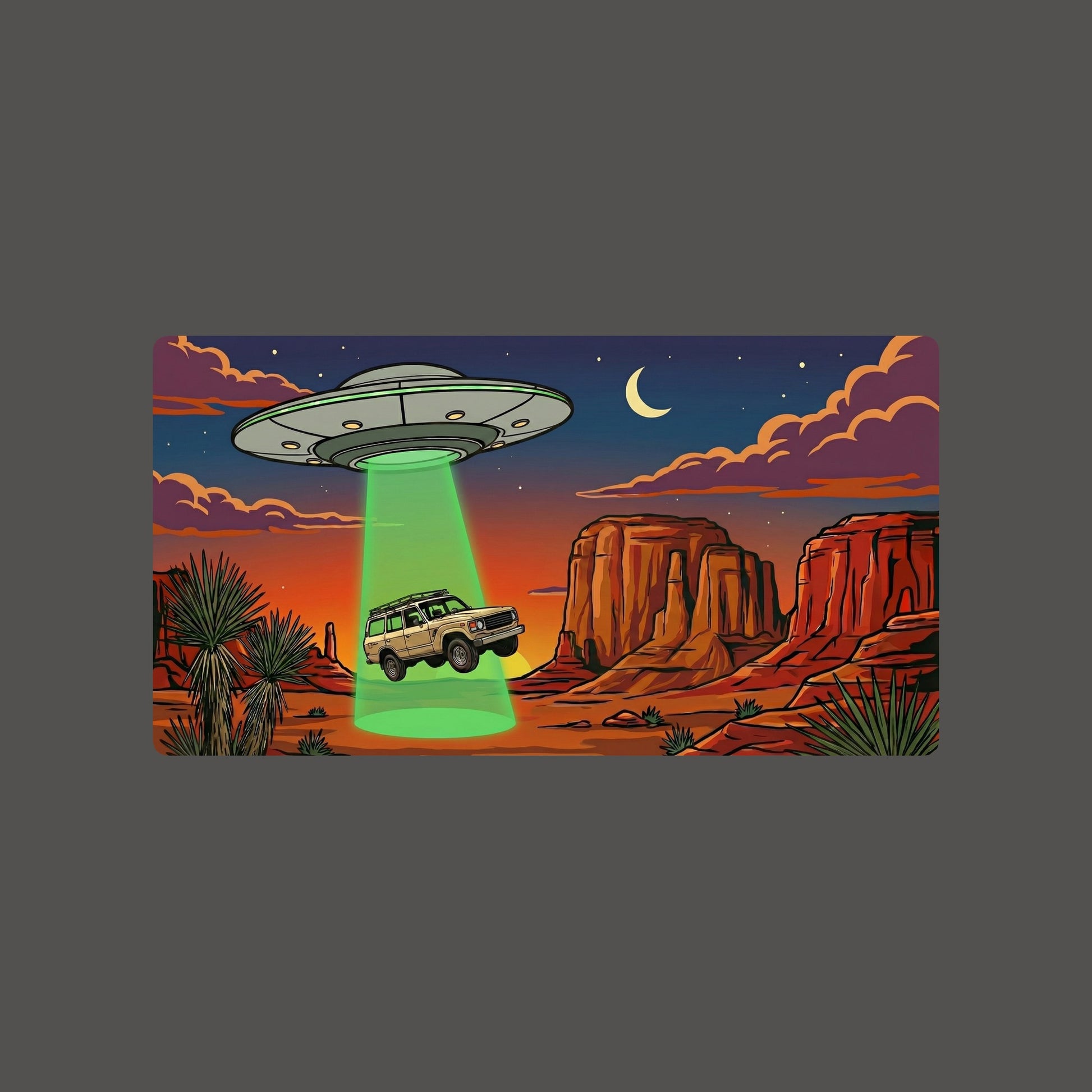 Close-up of the Desert Abduction Cruiser design on an Asphalt tee