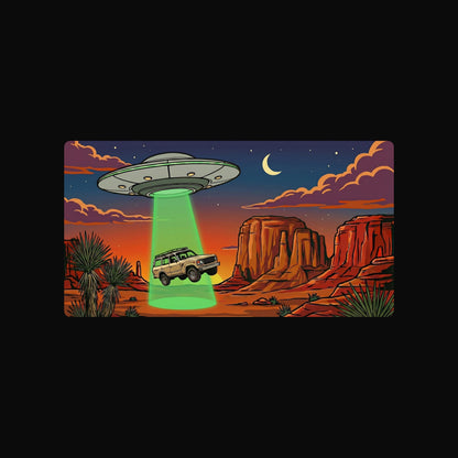 Close-up of the Desert Abduction Cruiser design on a Black Heather tee