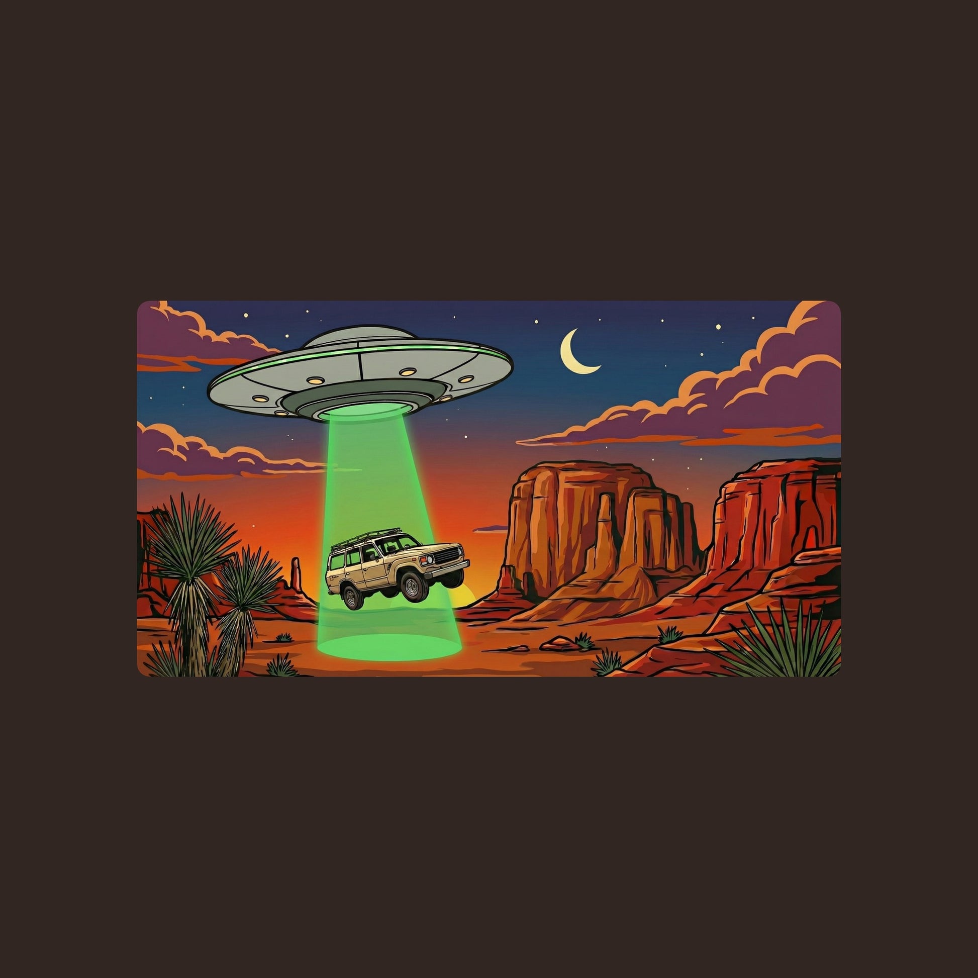 Close-up of the Desert Abduction Cruiser design on a Brown tee