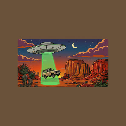 Close-up of the Desert Abduction Cruiser design on a Heather Brown tee
