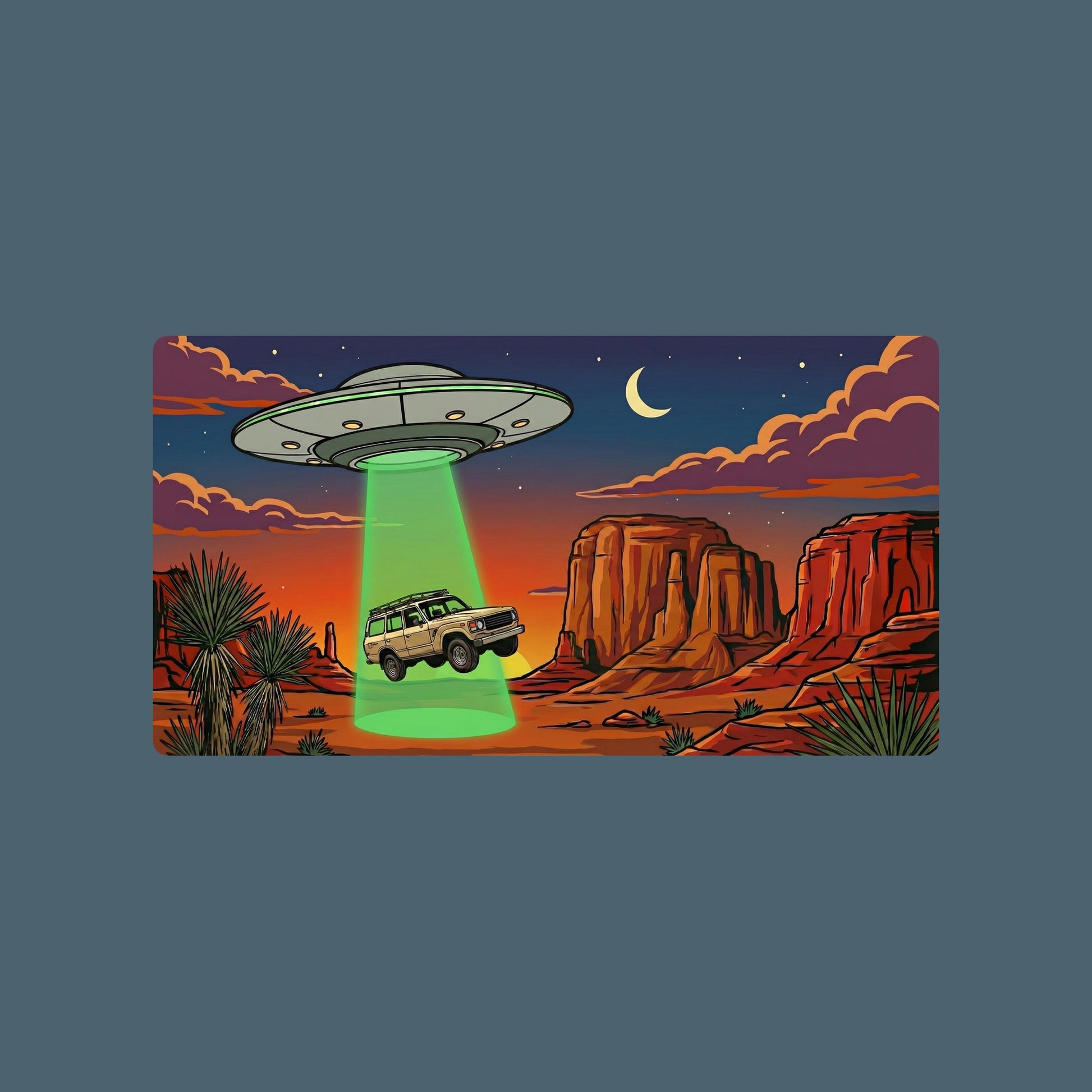 Close-up of the Desert Abduction Cruiser design on a Heather Slate tee