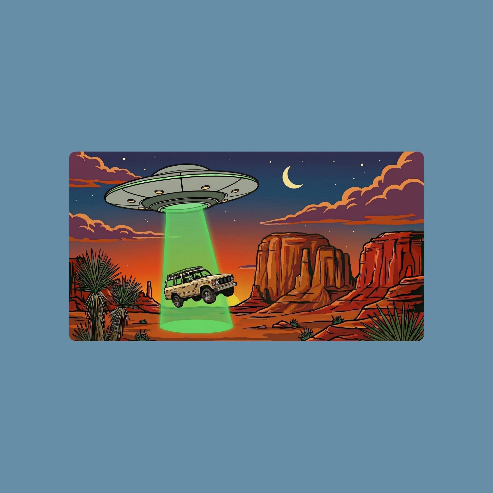 Close-up of the Desert Abduction Cruiser design on a Steel Blue tee